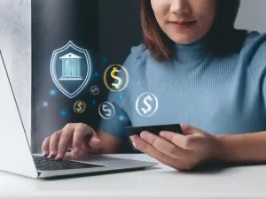 Illustration showing a financial institution strengthening its cybersecurity defenses to prevent data breaches and system compromises.